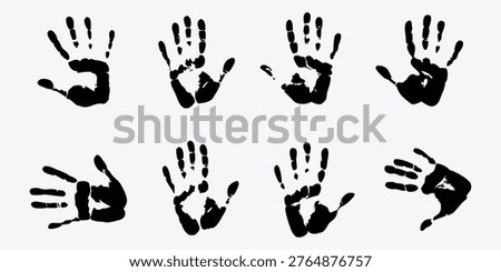 A collection of black handprints on a white background in silhouette mode