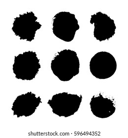 Collection of black ink brush strokes and print stamps. Vector grunge splatter stains isolated on white background. Artistic backdrop for logos, banners and headlines.