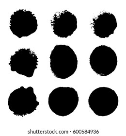 Collection of black ink brush strokes and print stamps. Vector grunge splatter stains isolated on white background. Artistic backdrop for logos, banners and headlines.
