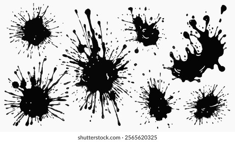 A collection of black ink splatters on a white background. Some of the splatters are large and some are small