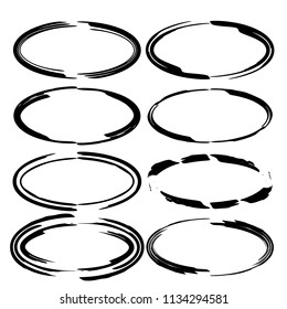 Collection of black oval grunge frames. Vector illustration.