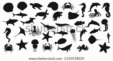 Collection of black set silhouettes of fish, seahorse, shells, octopuses, dolphins, sharks, whales, crabs and stingrays on a white background. Vector clipart Stock photo © 