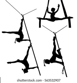 Collection of black silhouettes of air gymnasts on canvas. Aerial acrobatics.
