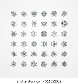 Collection of black snowflakes on a white background, vector illustration