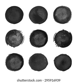 Collection of black watercolor round stains  on white background