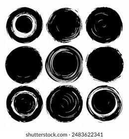 A collection of black and white circular shapes placed on a white backdrop