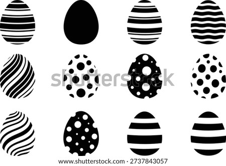 Collection of black and white decorated easter eggs with various patterns