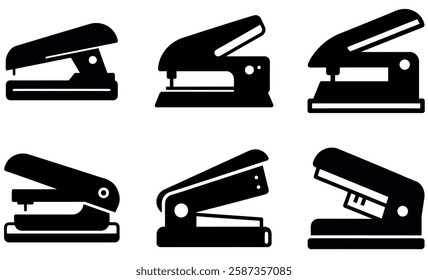 Collection of Black and White Staplers and Staple Removers