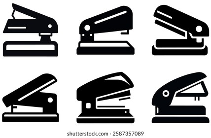 Collection of Black and White Staplers and Staple Removers