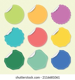 Collection of blank label stickers in different colors and shapes on a striped background 