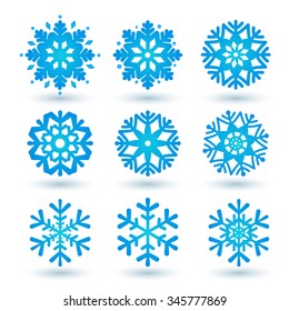 Collection of blue snowflakes on a white background