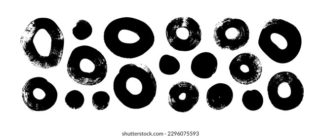 Collection brush drawn bold circles. Hand drawn irregular round shapes with dry texture. Set of thick blots and round brush strokes isolated on white background. Retro organic elements.