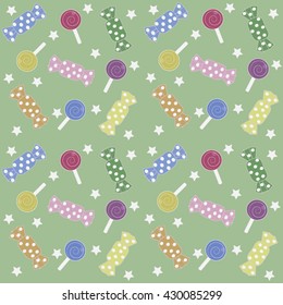 Collection of Candies on Green Background.
