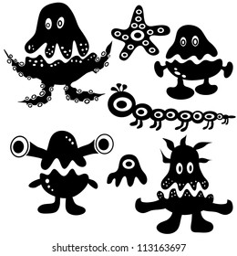collection of cartoon funny monsters silhouettes