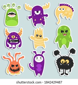 Collection of cartoon funny monsters stickers.