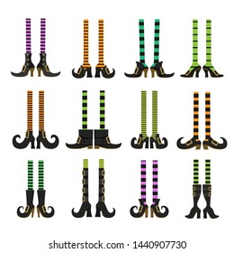 Collection of cartoon witch legs in striped stockings and various shoes isolated on a white background