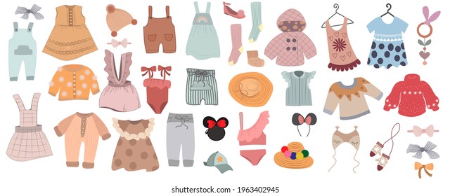 A collection of children's clothing for decorating a child's nursery. A set of summer collection of fashionable clothes for girls and boys. Handmade items with jumper, suit, dress, shoes, toys. Flat