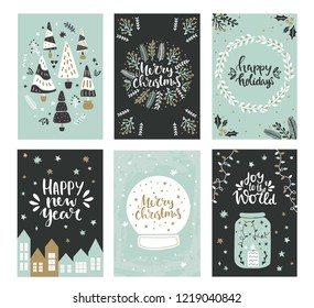 Collection of christmas greeting cards with hand lettering and hand drawn winter holiday and christmas elements and floral arrangement