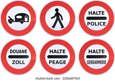 Collection of circular red, black and white road prohibition signs with the prohibition to pedestrians, vehicles towing a caravan and halt police, toll, gendarmerie in English, French and German