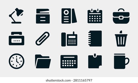 Collection of dark blue office and desk supplies on a light gray background lamp