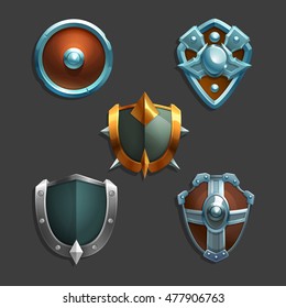 Collection of decoration armor for games. Set of medieval cartoon shields. Vector illustration.