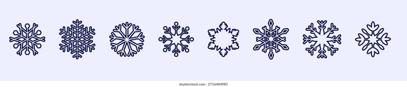 A collection of detailed snowflake patterns on a light background, ideal for winter designs and crafts.