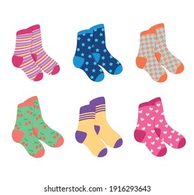 Collection of different colored socks. Vector illustration set of socks with patterns
