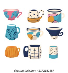 Collection of different modern cups decorated with design elements vector flat illustration. Set of colored mugs. Vintage cups isolated on white background