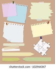 Collection of different shape and size ripped colored notepaper, adhesive tape and pieces of puzzle pinned with pushpins on brown background 