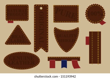 Collection of different sized and shaped brown leather stickers, shields and badges with stitching