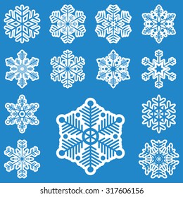 collection of different white snowflakes on blue background