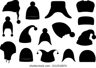 Collection of different winter hats isolated on white