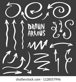 Collection of Doodle Arrows Drawn by Hand on Dark Background, Arrow Set Freehand