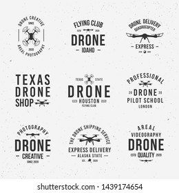 Collection of Drone logos, emblems, labels, badges. Set of 9 logo templates. Drone business. Vector illustration