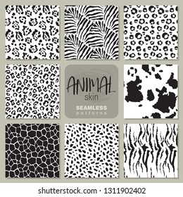 Collection of eight black and white vector seamless patterns with animal skin zebra, leopard, jaguar, giraffe cow. Set of Endless modern background.