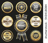 Collection of elegant black and gold design elements - buttons, badges, labels