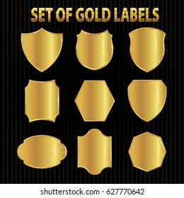 collection of elegant black and golden design elements - shields, labels, seals, banners, badges, scrolls and ornaments