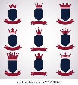 Collection of empire design elements. Heraldic royal coronet illustration - imperial striped decorative coat of arms. Set of luxury vector shields with king red crown and undulate festive ribbon.