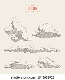 Collection of engraved style clouds. Hand drawn vector illustration, sketch