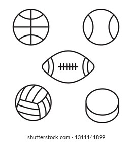 A collection of five different sports balls including a tennis ball, volleyball, basketball, football, and a hockey puck.