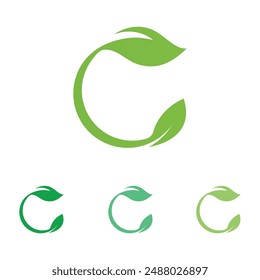 Collection of four green leaf and swirl eco-friendly logos.