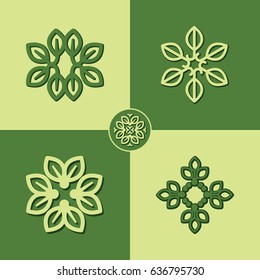 COLLECTION OF FOUR LOGO DESIGN TEMPLATES - NATURAL, ORGANIC ELEMENTS  / ICONS / SYMBOLS ISOLATED ON GREEN BACKGROUND