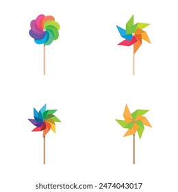 Collection of four vibrant pinwheels in different color schemes isolated on a white backdrop