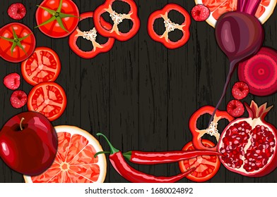 Collection of fresh red color vegetables and fruits raw on wooden background