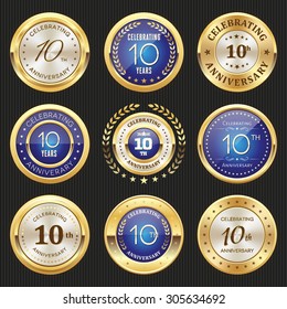 Collection of glossy gold and blue 10th anniversary badges