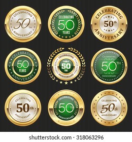 Collection of glossy gold and green 50th anniversary badges