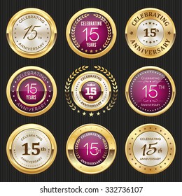 Collection of glossy gold and purple 15th anniversary badges