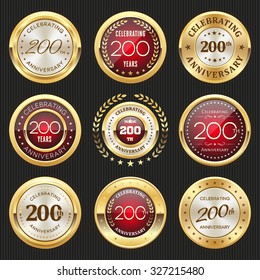 Collection of glossy gold and red 200th anniversary badges