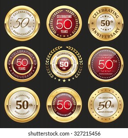 Collection of glossy gold and red 50th anniversary badges