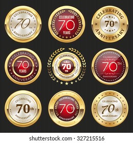Collection of glossy gold and red 70th anniversary badges